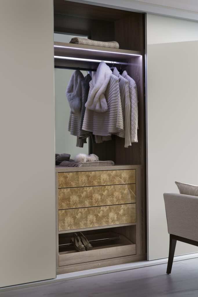 bespoke sliding wardrobe design with storage