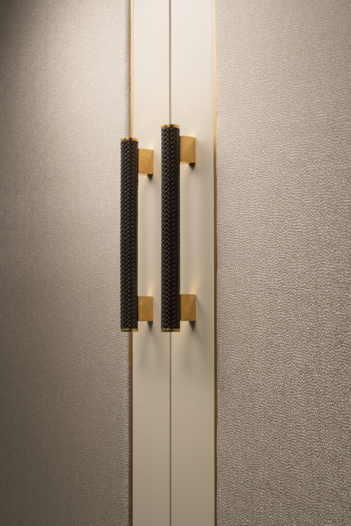 Close up of the pale grey Belgravia wardrobe handles