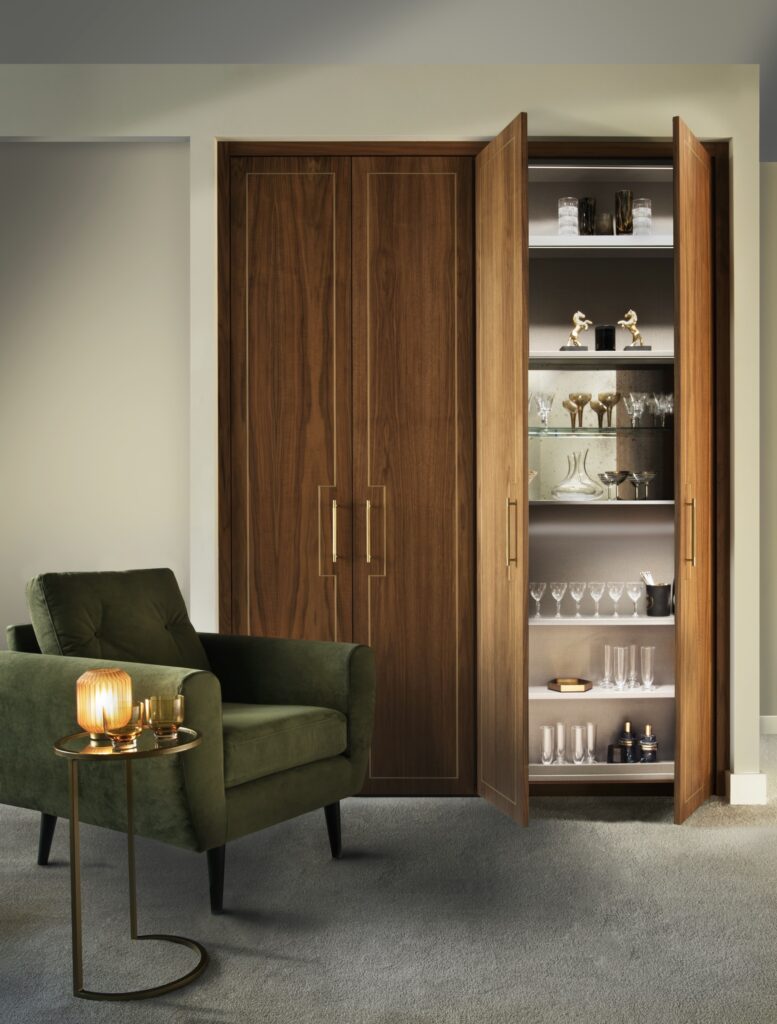 Wide shot of otto door with bar with green velvet chair