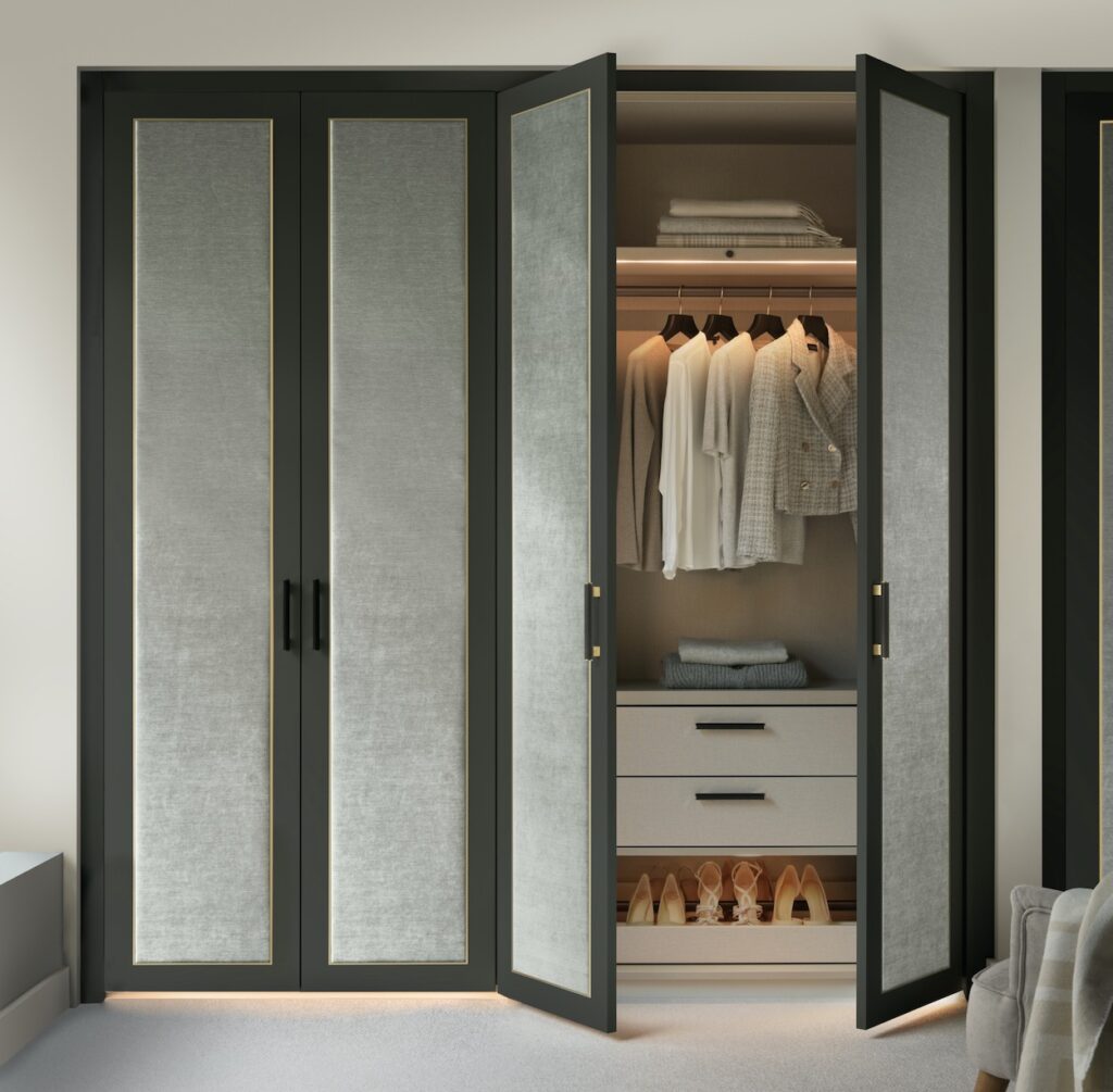 Dark grey painted wood and light grey fabric panelled Belgravia style wardrobe lifestyle image.